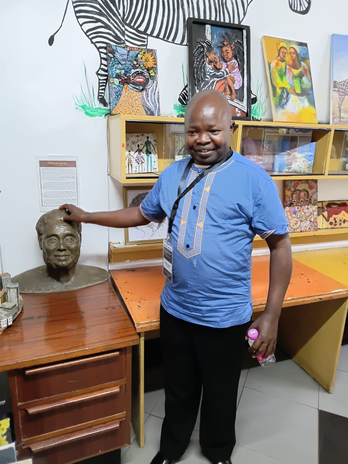 Researcher at National Museum with bust